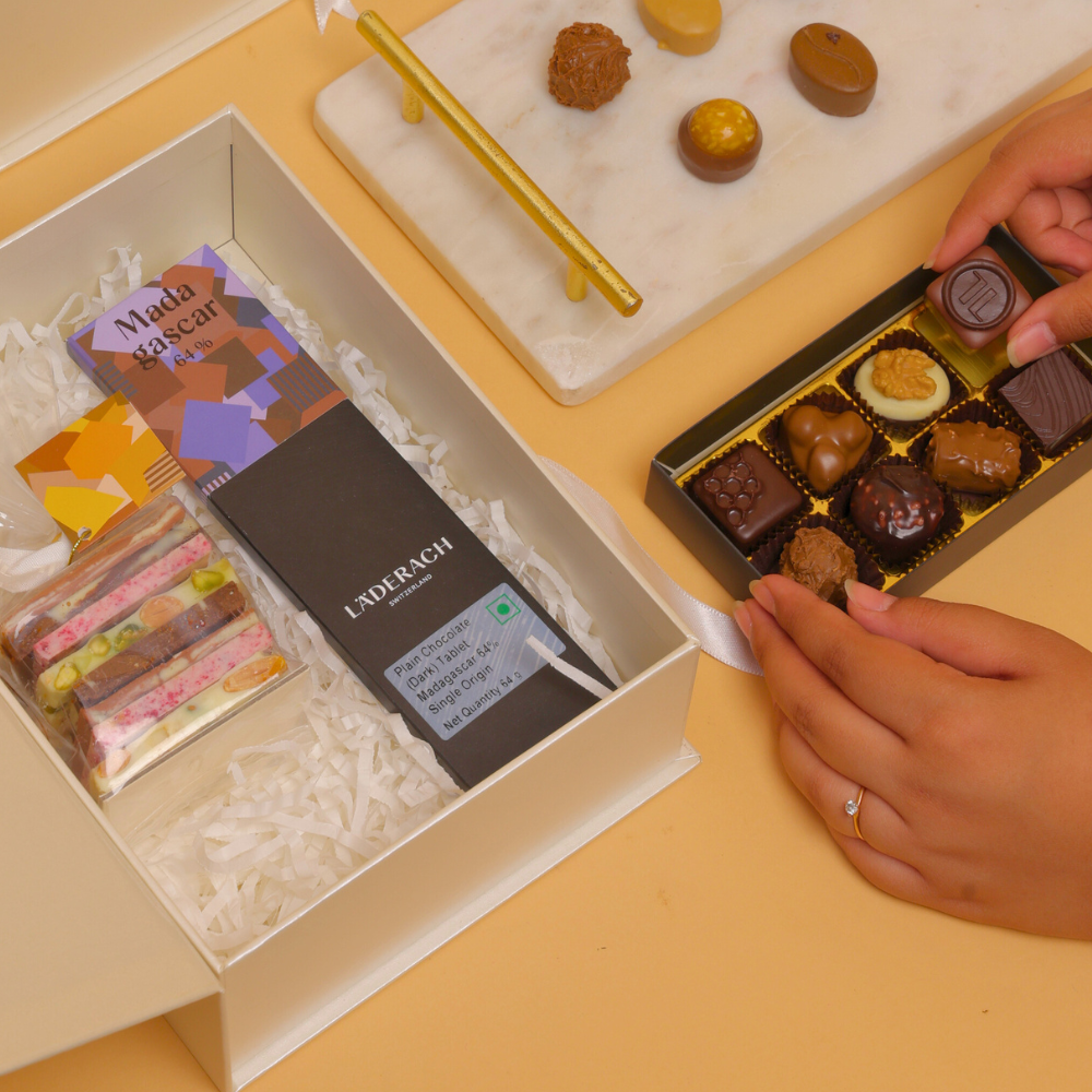 Assorted Pralines and Truffles (8pieces) + Assorted FrischSchoggi (250 grams) + Tablet (1 Piece)